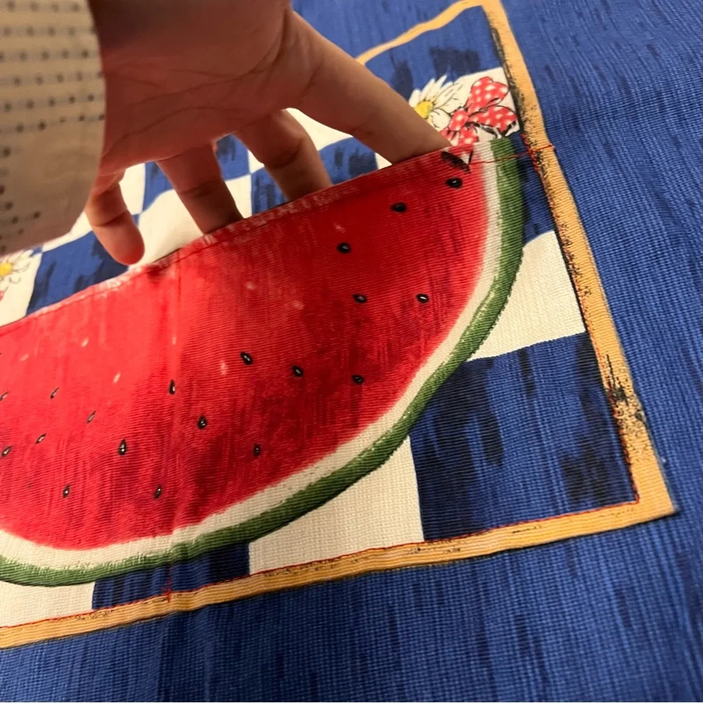 This is a vintage folk cottage style watermelon apron in red, white, and blue